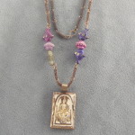 Talisman:  Lion Buddha Amulet with Vintage Metal Beads